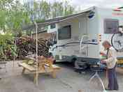 Hardstanding electric hook-up pitch suitable for motorhomes, caravans and long wheeled base vans.