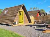 Yellow glamping pod.