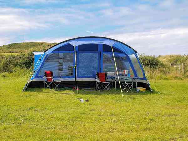 Non-electric grass tent pitch