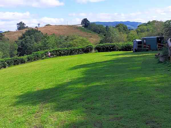 Non-electric grass tent or trailer tent pitch