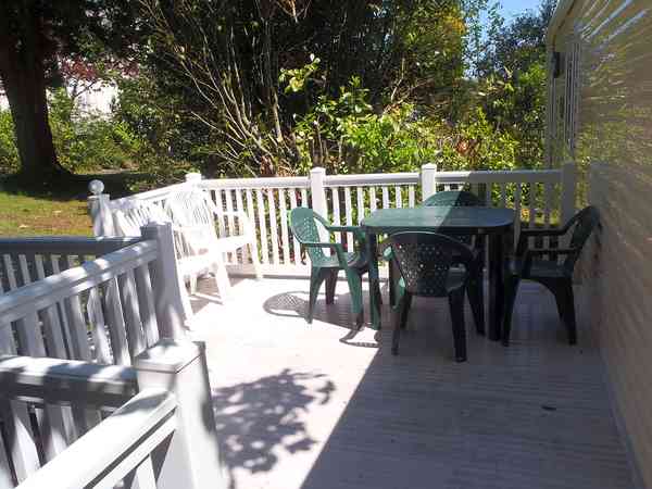 Outside deck area with table and chairs Outside deck area with table and chairs