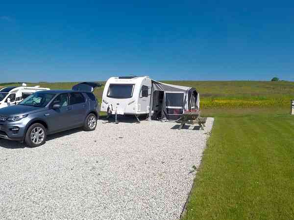 Fully-serviced hardstanding touring pitch
