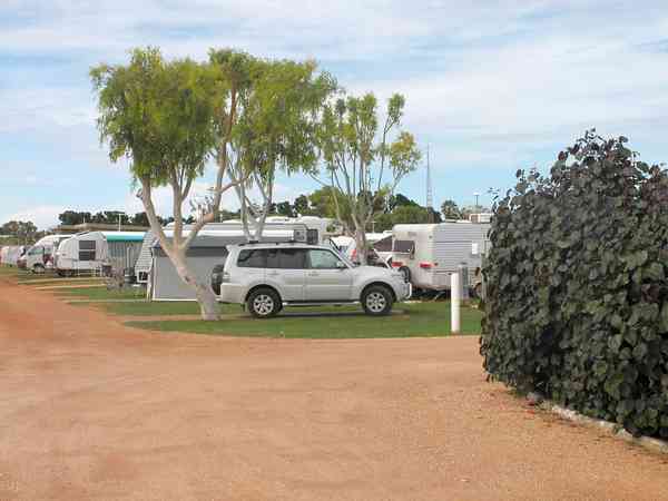 Fully-serviced hardstanding and grass pitch