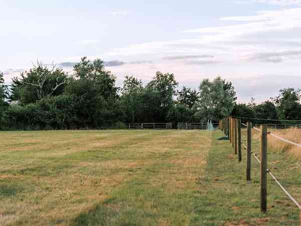Non-electric grass tent or trailer tent pitch