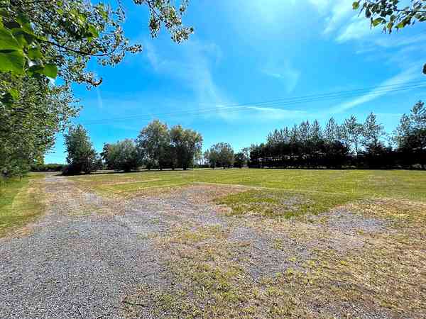 Electric hardstanding and grass touring pitch