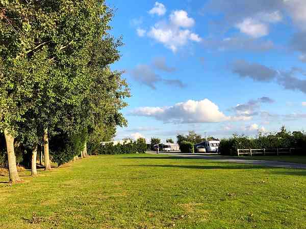 Powered grass caravan site