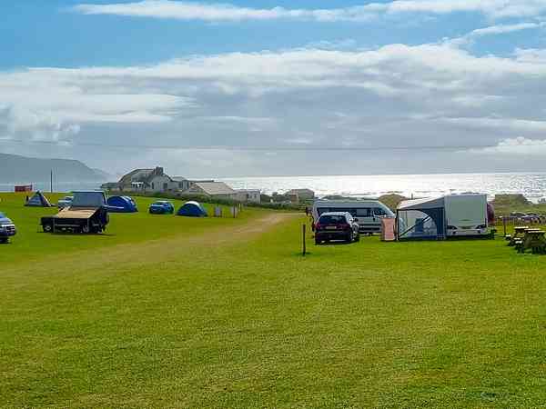 Primitive grass tent or trailer tent site