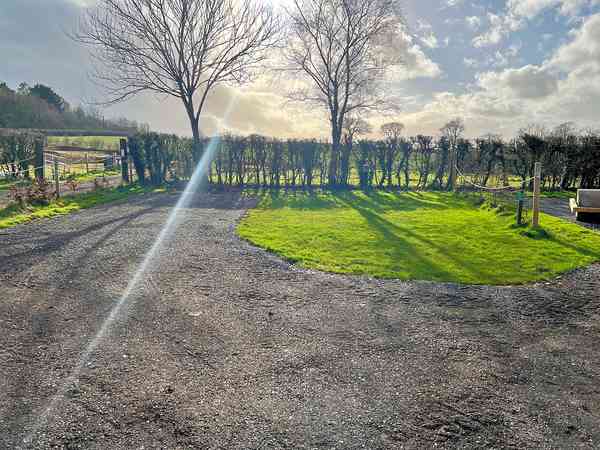 Powered concrete and grass caravan site (XL)