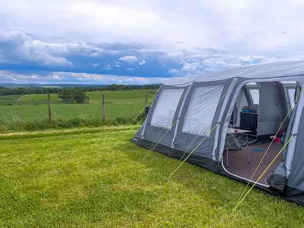 Non-electric grass tent pitch (eight person)