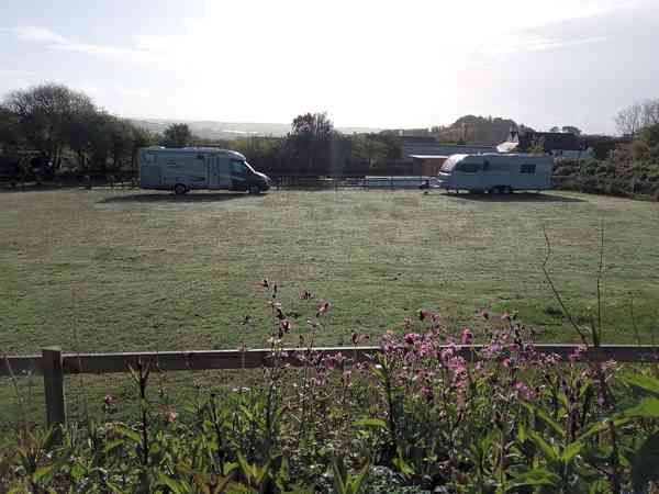 Electric grass and earth touring pitch