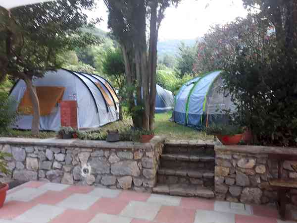 Electric grass and earth tent or trailer tent pitch