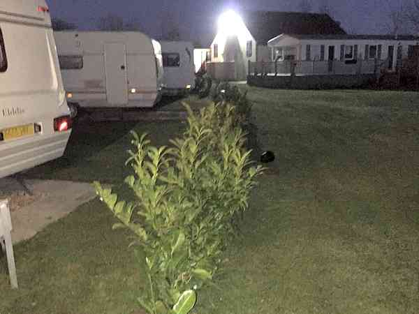 Electric optional grass touring caravan pitch
