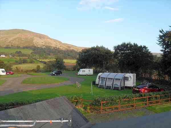 Caravan and awning in front of Benbradagh Caravan and awning in front of Benbradagh