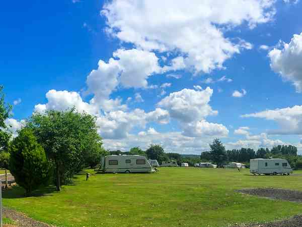 Power optional grass travel trailer site