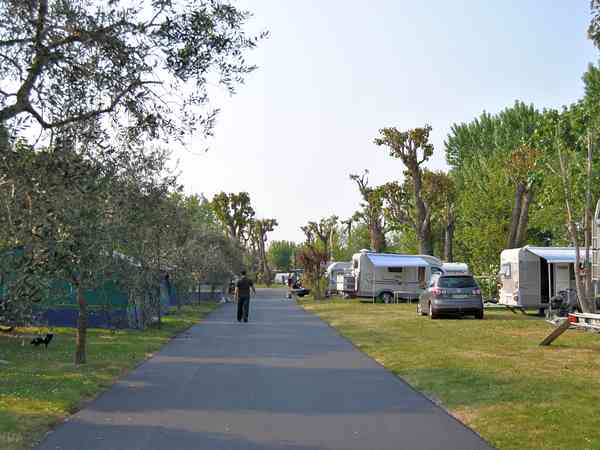 On the right, a pitch on the lake shore On the right, a pitch on the lake shore