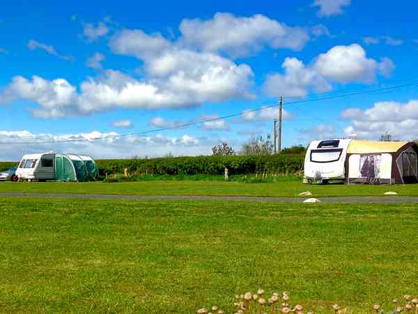 Fully-serviced grass and gravel touring pitch