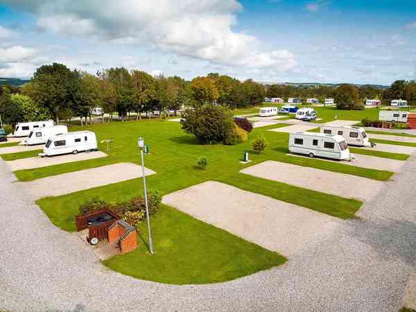 Powered concrete slab caravan site