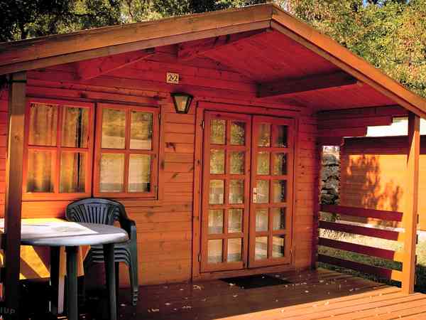 A microlodge with a deck terrace A microlodge with a deck terrace