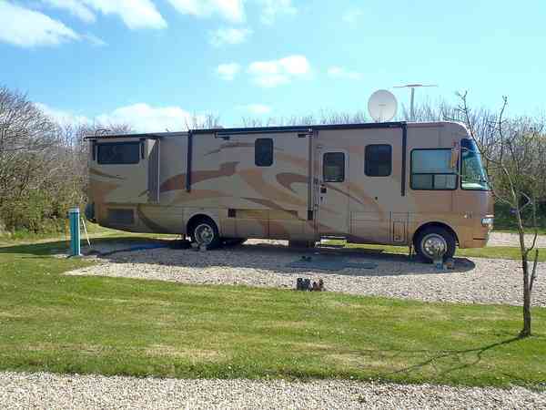 Large level pitches, perfect for large motorhomes Large level pitches, perfect for large motorhomes