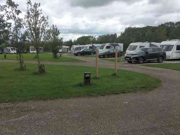 Electric hardstanding and grass motorhome pitch