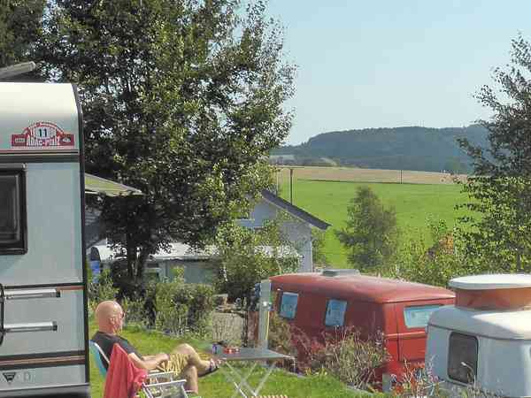 Electric grass and gravel touring pitch