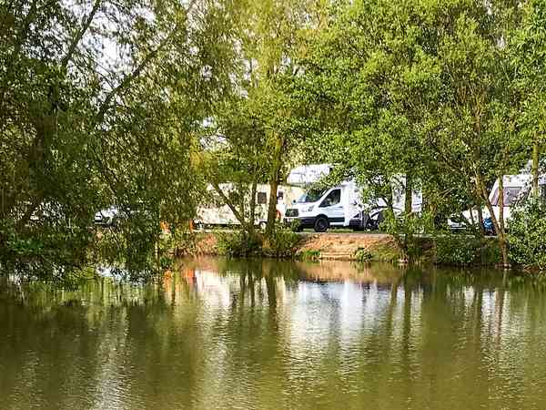 Fully-serviced hardstanding touring pitch (lake view)