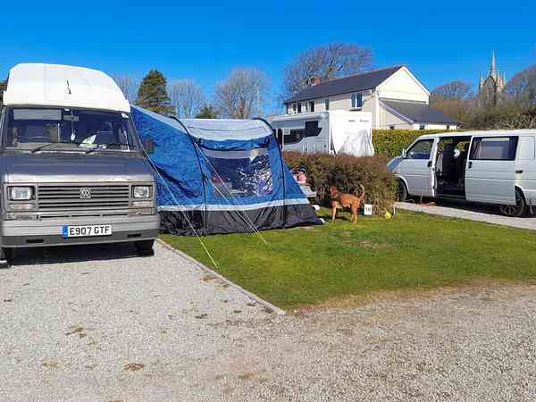 FHU cement/asphalt and grass travel trailer site