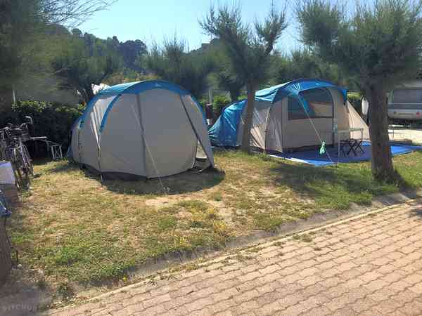 Electric grass and gravel tent pitch