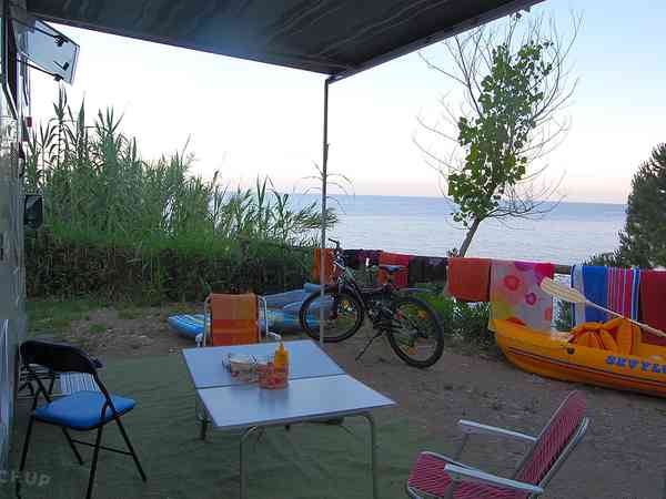Electric optional earth touring caravan pitch
