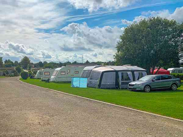 Power optional grass site (2 adults and 2 children)