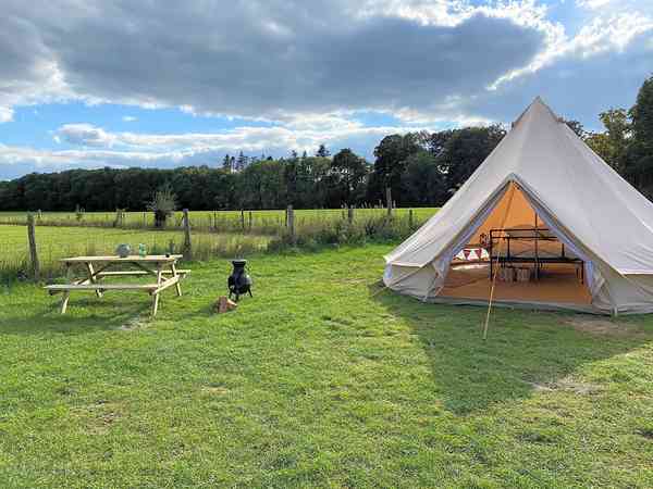 Bell tent with chiminea and picnic bench Bell tent with chiminea and picnic bench