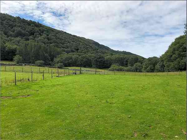 Field pitches sheltered in the valley Field pitches sheltered in the valley