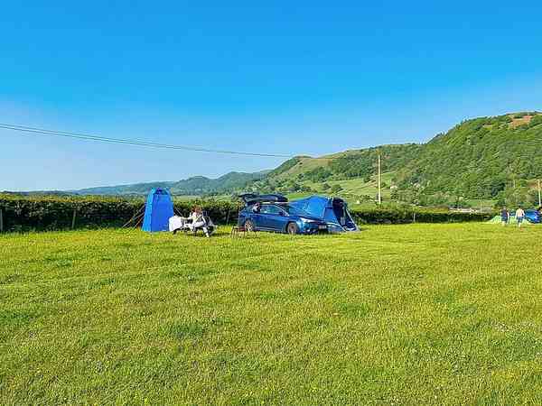 Unpowered grass tent or trailer tent site