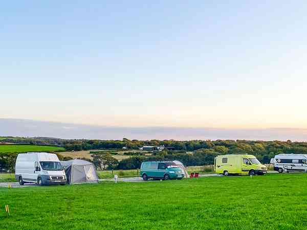 Non-electric hardstanding and grass touring pitch