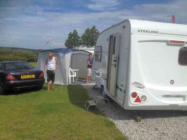 Electric grass and gravel touring pitch (no awning)