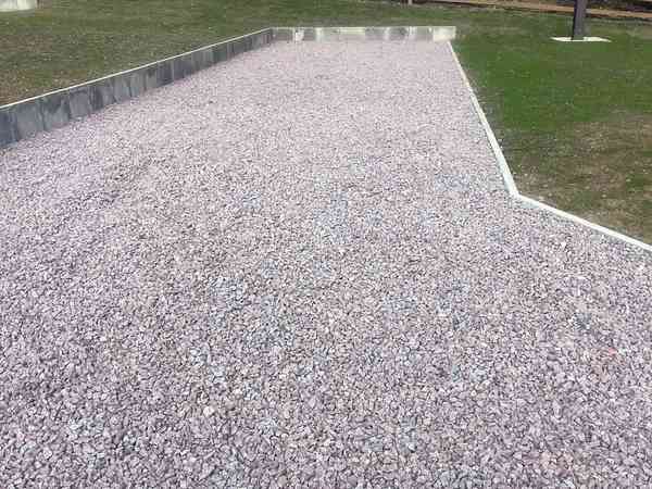 Hardstanding red granite gravelled serviced pitch Hardstanding red granite gravelled serviced pitch