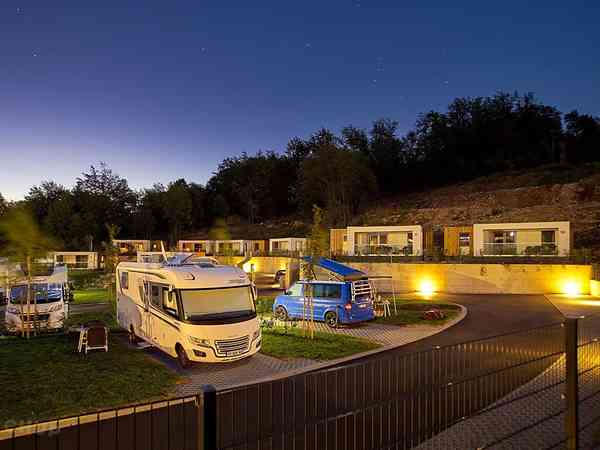 Electric hardstanding and grass touring pitch