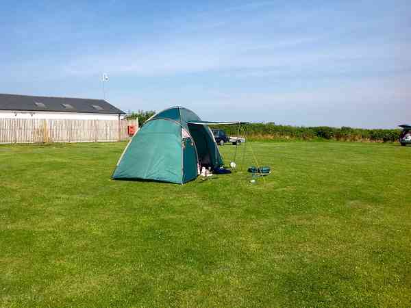 Non-electric grass tent, trailer tent or campervan pitch (2 adults and 3 children, large)