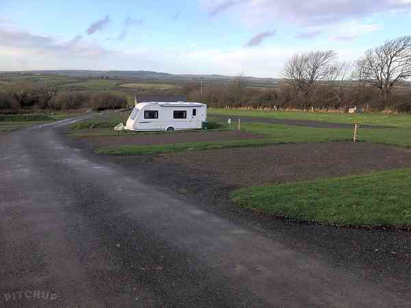 Fully-serviced grass and gravel touring pitch