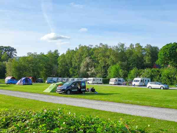 Unpowered grass tent or trailer tent site