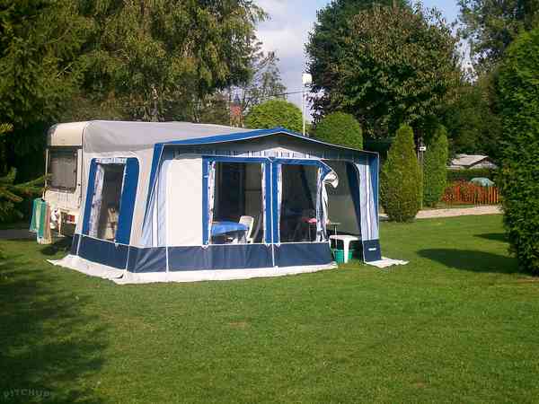 Electric optional hardstanding and grass touring pitch