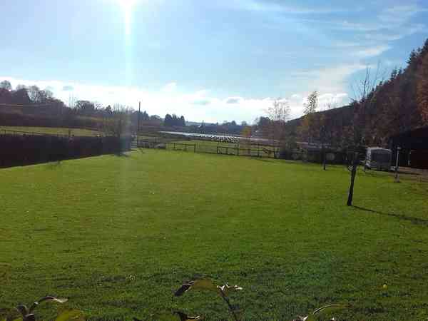 Electric hardstanding and grass pitch