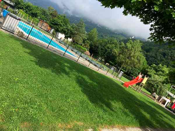 Sunny pitch with a pool view Sunny pitch with a pool view