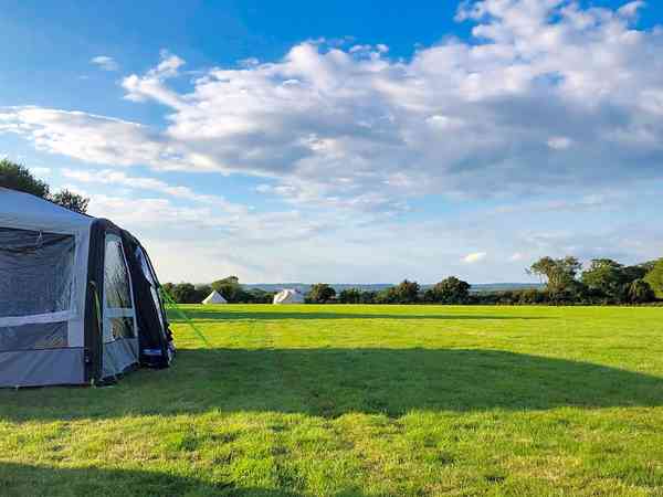 Unpowered grass tent site