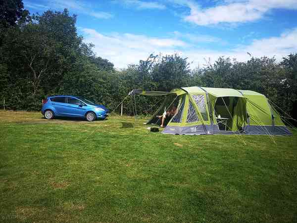 Electric optional grass tent or trailer tent pitch