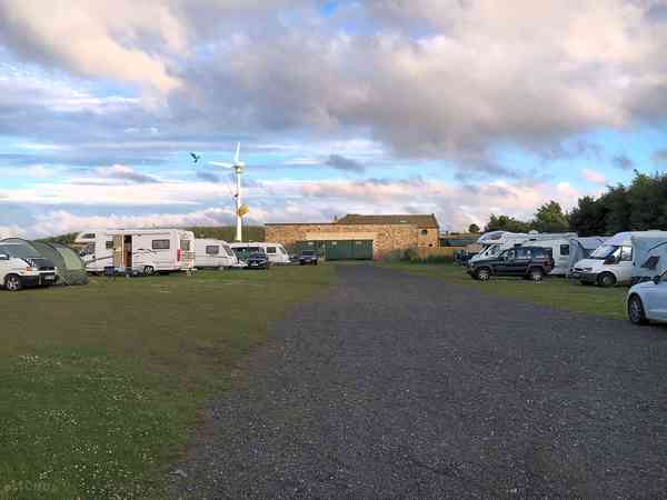 Powered asphalt and grass site
