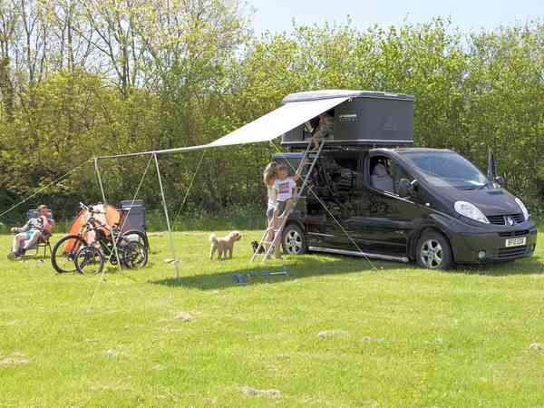 Primitive grass tent or trailer tent site