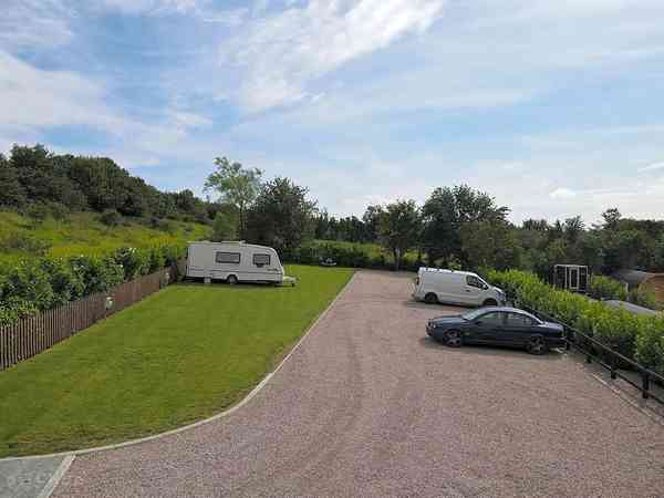 Fully-serviced grass pitch