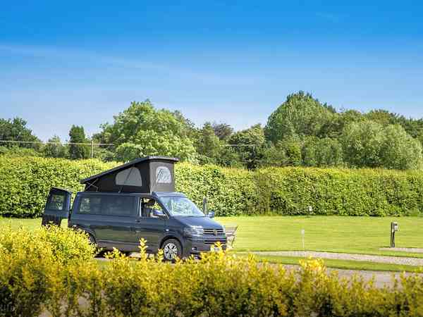 Electric grass and gravel touring pitch
