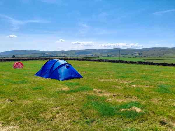 Non-electric grass tent pitch
